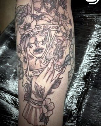 Tarot-inspired ornamental hand and forearm piece