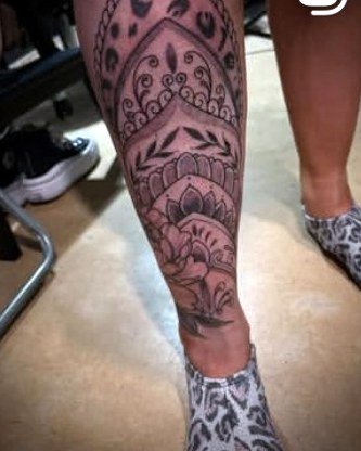 Ornamental mandala on the lower leg